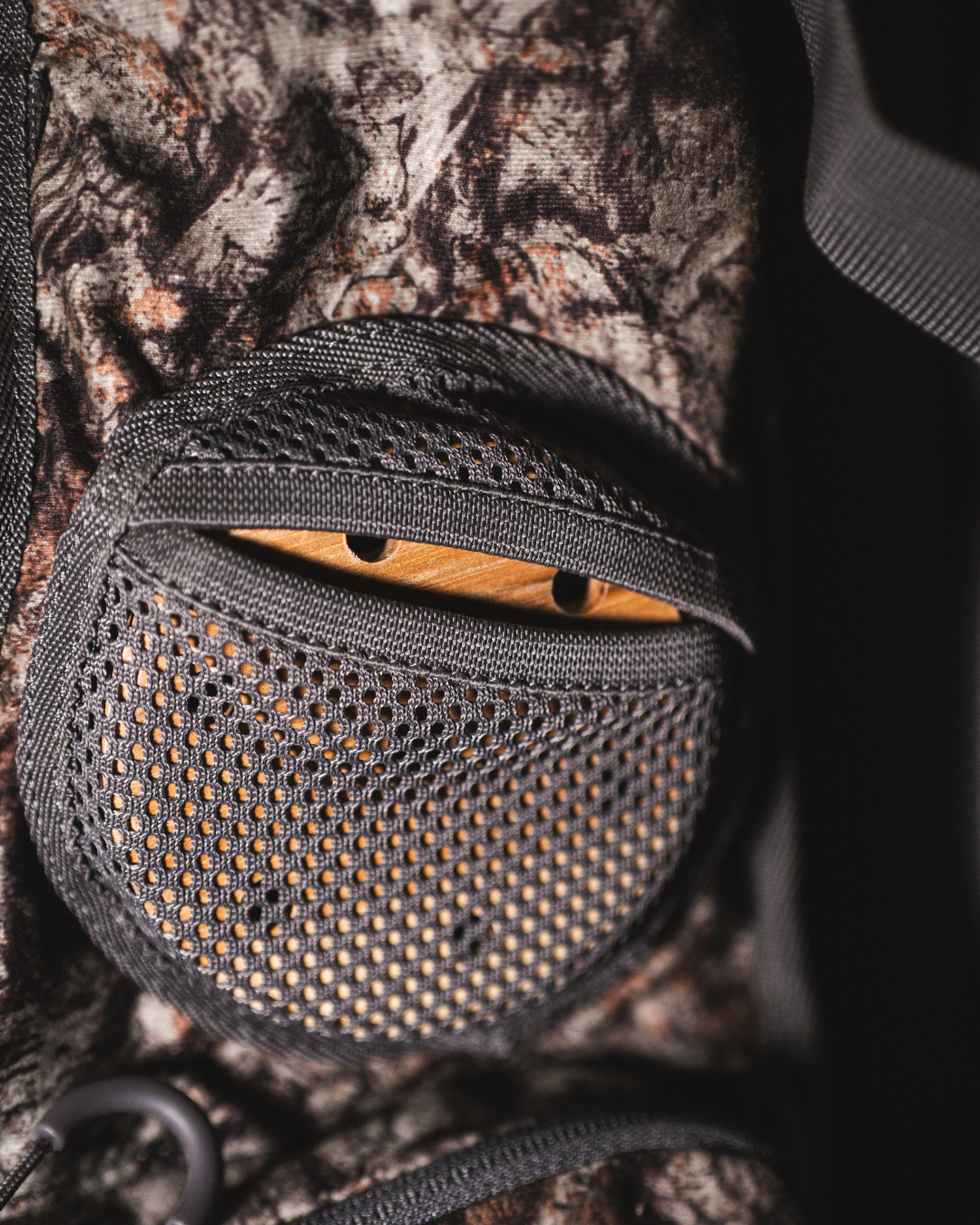 ASIO Gear RAPTOR camo turkey vest mesh pot call holder designed for secure and quiet access in the field